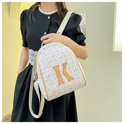 Μικρό μοντέρνο γυναικείο σακίδιο πλάτης από οικολογικό δέρμα με φερμουάρ