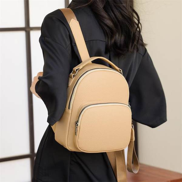 Γυναικείο σακίδιο πλάτης καθαρού σχεδιασμού από τεχνητό δέρμα με μπροστινή τσέπη και κλείσιμο με φερμουάρ