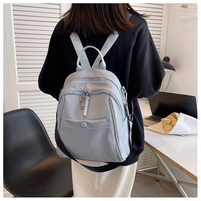 Naujo modelio moteriška odinė kuprinė su keliais skyreliais