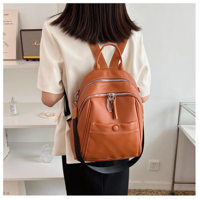 Naujo modelio moteriška odinė kuprinė su keliais skyreliais