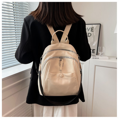 Naujo modelio moteriška odinė kuprinė su keliais skyreliais