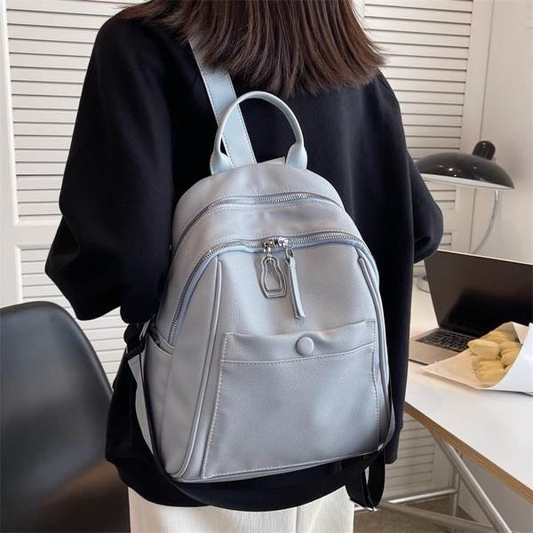 Naujo modelio moteriška odinė kuprinė su keliais skyreliais