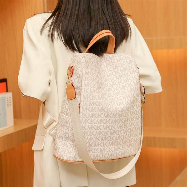 Madinga moteriška odinė kuprinė su užpakaline kišene ir užrašu