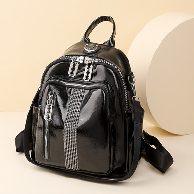 Lukkude ja dekoratiivkividega naiste seljakott