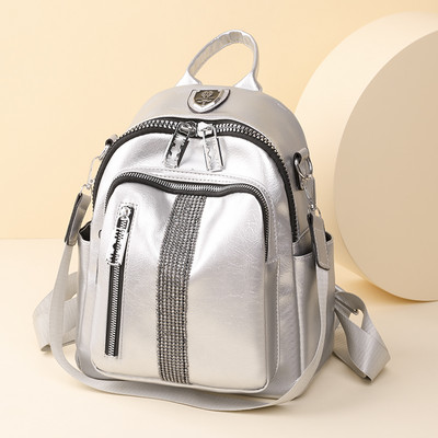 Lukkude ja dekoratiivkividega naiste seljakott