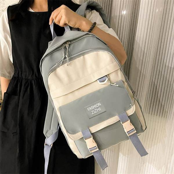 Moteriška tekstilinė kuprinė su priekine kišene ir plastikine užsegimu