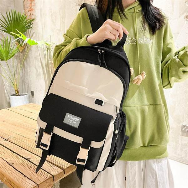 Moteriška tekstilinė kuprinė su priekine kišene ir plastikine užsegimu