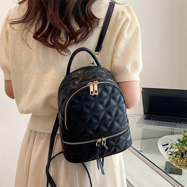 Lukuga puhta disainiga naiste seljakott