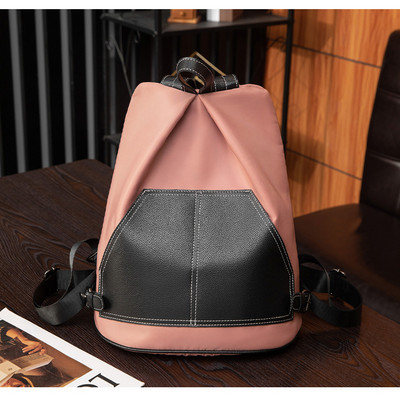 Moteriška kasdieninė kuprinė švaraus modelio iš tekstilės