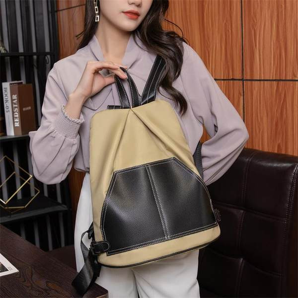 Moteriška kasdieninė kuprinė švaraus modelio iš tekstilės