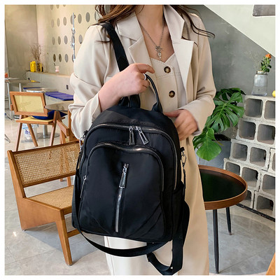 Neperšlampama moteriška keturių madingų spalvų kuprinė