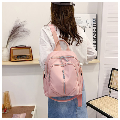 Neperšlampama moteriška keturių madingų spalvų kuprinė