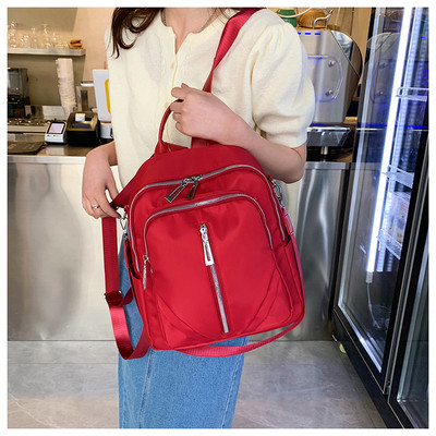 Neperšlampama moteriška keturių madingų spalvų kuprinė