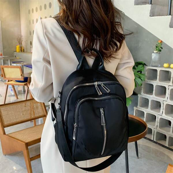 Neperšlampama moteriška keturių madingų spalvų kuprinė