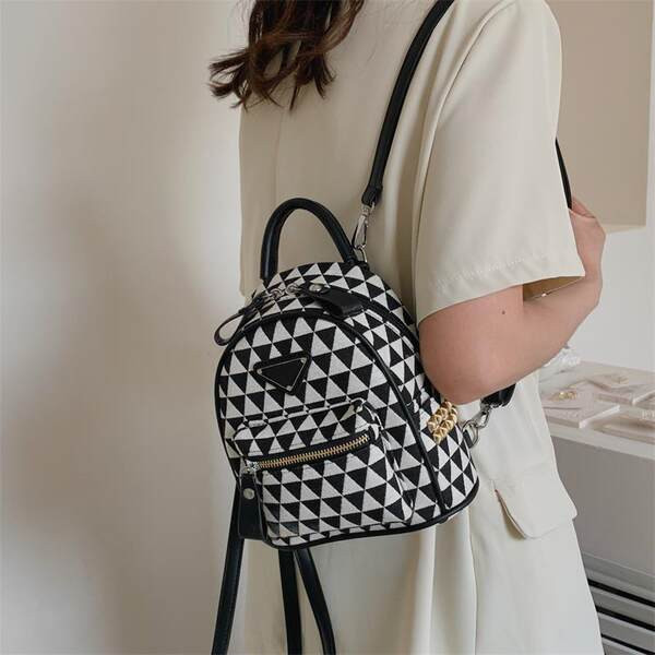 Moteriška moderni tekstilinė kuprinė su priekine kišene ir užtrauktuku