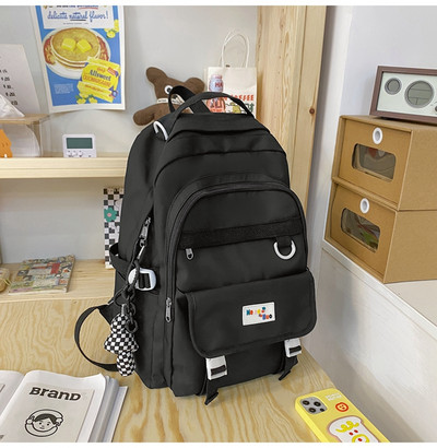 Moteriška kasdienė kelių spalvų kuprinė