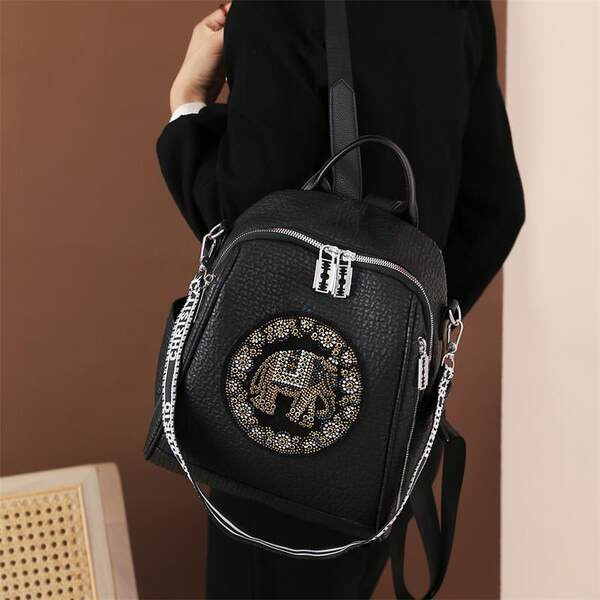 Naiste musta värvi dekoratiivkividega seljakott