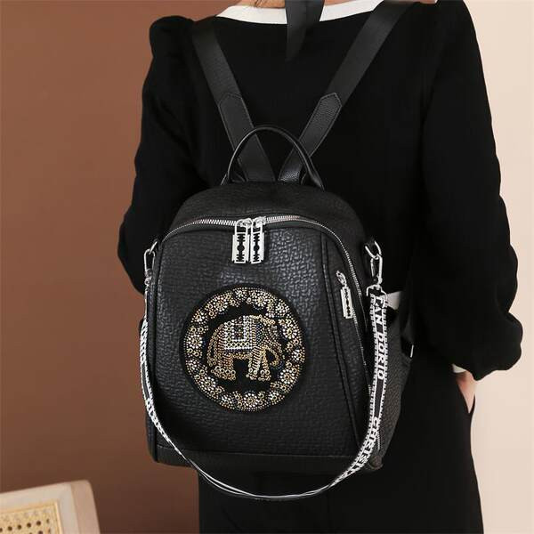 Naiste musta värvi dekoratiivkividega seljakott