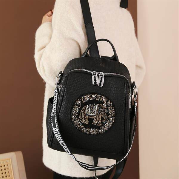 Naiste musta värvi dekoratiivkividega seljakott