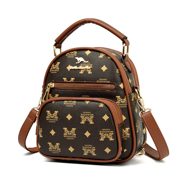 Naiste vabaaja dekoratiivelementidega ökonahast seljakott