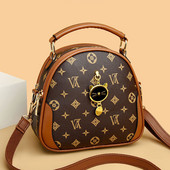 Moteriška nedidelė laisvalaikio rankinė su metaline apdaila