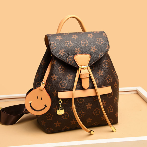 Γυναικείο οικολογικό δερμάτινο σακίδιο πλάτης casual με πόρπη και μπρελόκ Smile