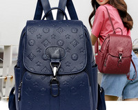 Moteriška eko odos kuprinė su keliais skyreliais ir metaliniu užsegimu