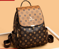 Γυναικείο δερμάτινο σακίδιο πλάτης με μεταλλικό κούμπωμα