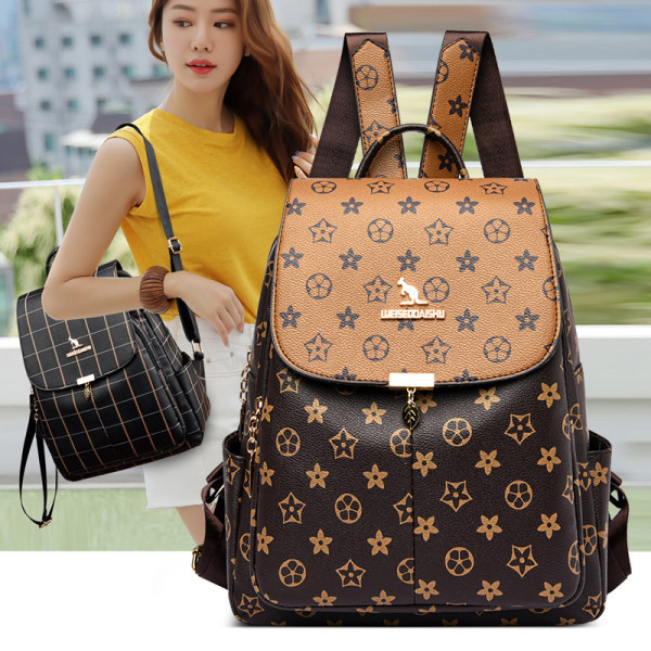 Γυναικείο δερμάτινο σακίδιο πλάτης με μεταλλικό κούμπωμα