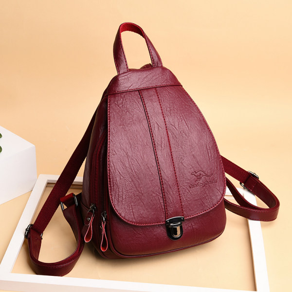 Γυναικείο σακίδιο πλάτης από τεχνητό δέρμα με μεταλλικό κούμπωμα