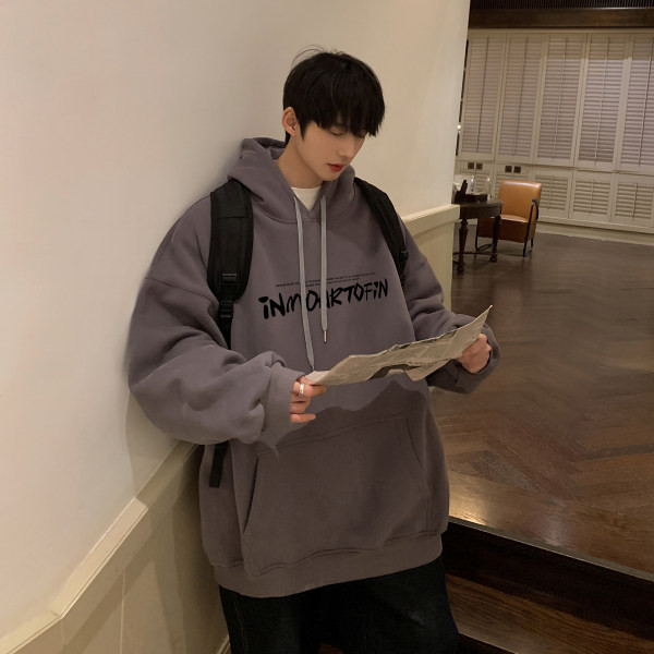 Tasku ja dekoratiivkirjaga meeste dressipluus