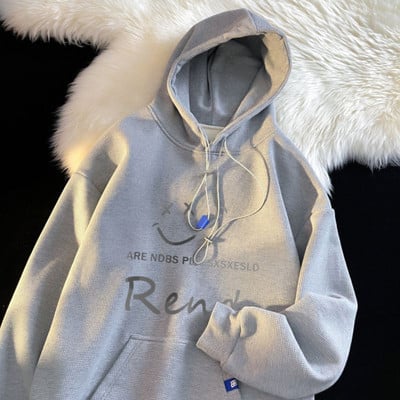 Férfi kapucnis pulóver nyakkendővel