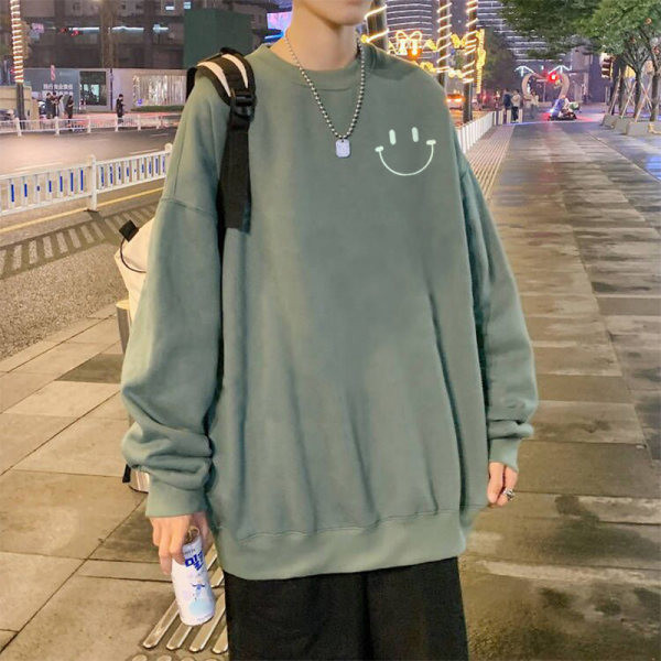 Įvairių spalvų vyriški megztiniai su šypsena