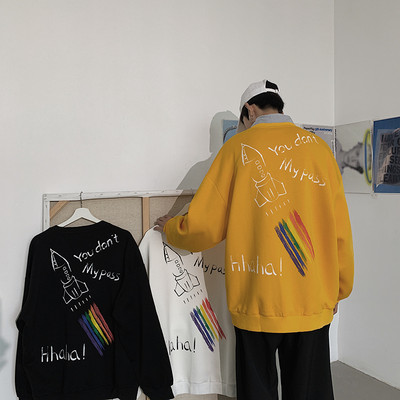 Įvairių spalvų džemperis su dekoratyvinėmis aplikacijomis