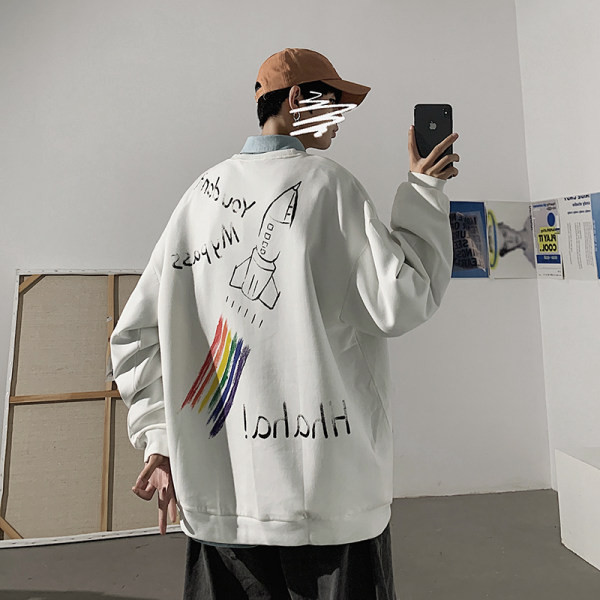 Įvairių spalvų džemperis su dekoratyvinėmis aplikacijomis