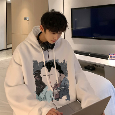 Széles modell férfi pulóver zsebbel és színes mintával