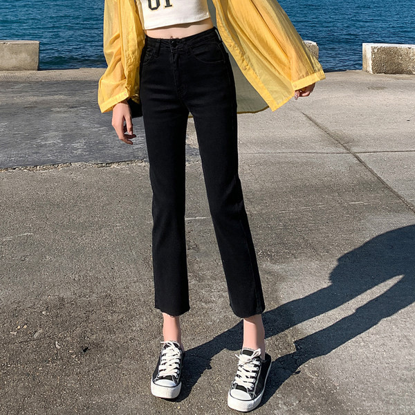 Naiste mustad kitsad teksad