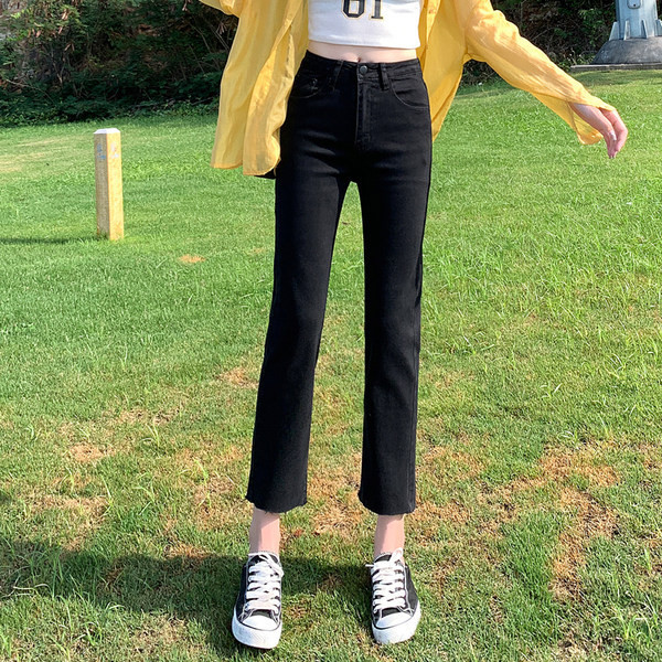 Naiste mustad kitsad teksad