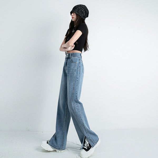 Dviejų spalvų moteriški džinsai su skeltuku