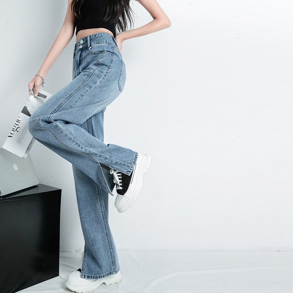 Dviejų spalvų moteriški džinsai su skeltuku