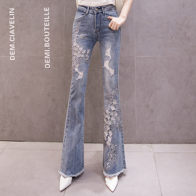 Moteriški džinsai – aukštu juosmeniu ir siuvinėjimais