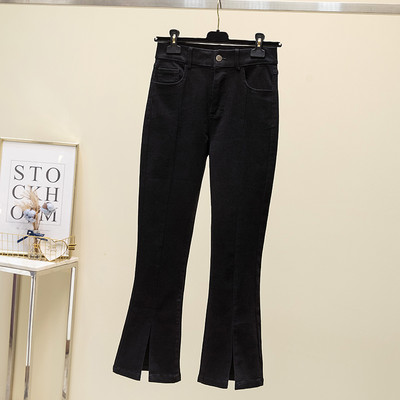 Moteriški džinsai su skeltuku ir aukštu juosmeniu