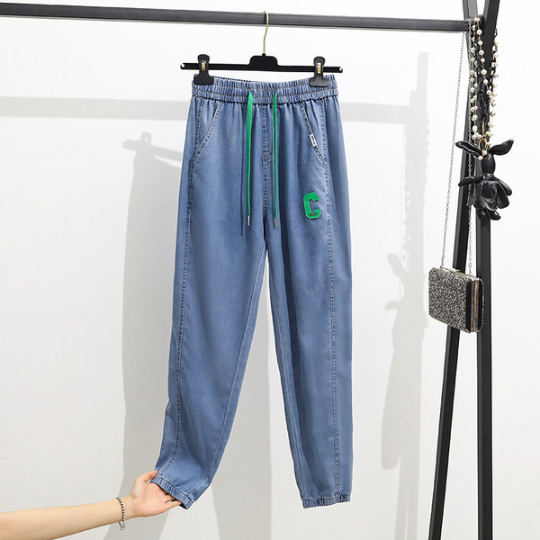 Moteriški džinsai su raišteliais ir kišene