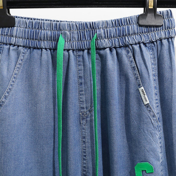 Moteriški džinsai su raišteliais ir kišene