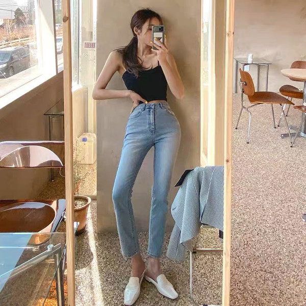 Moteriški džinsai su užtrauktuku ir kišenėmis