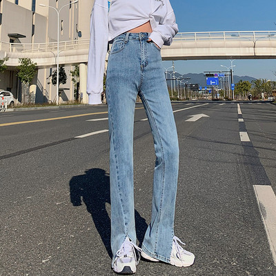 Kahes värvitoonis lõhiku ja taskuga naiste teksad