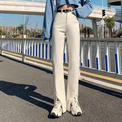 Kahes värvitoonis lõhiku ja taskuga naiste teksad