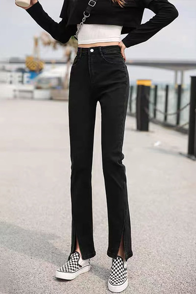 Kahes värvitoonis lõhiku ja taskuga naiste teksad