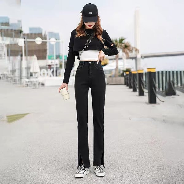 Kahes värvitoonis lõhiku ja taskuga naiste teksad