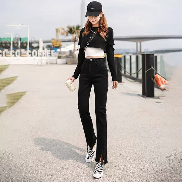 Kahes värvitoonis lõhiku ja taskuga naiste teksad